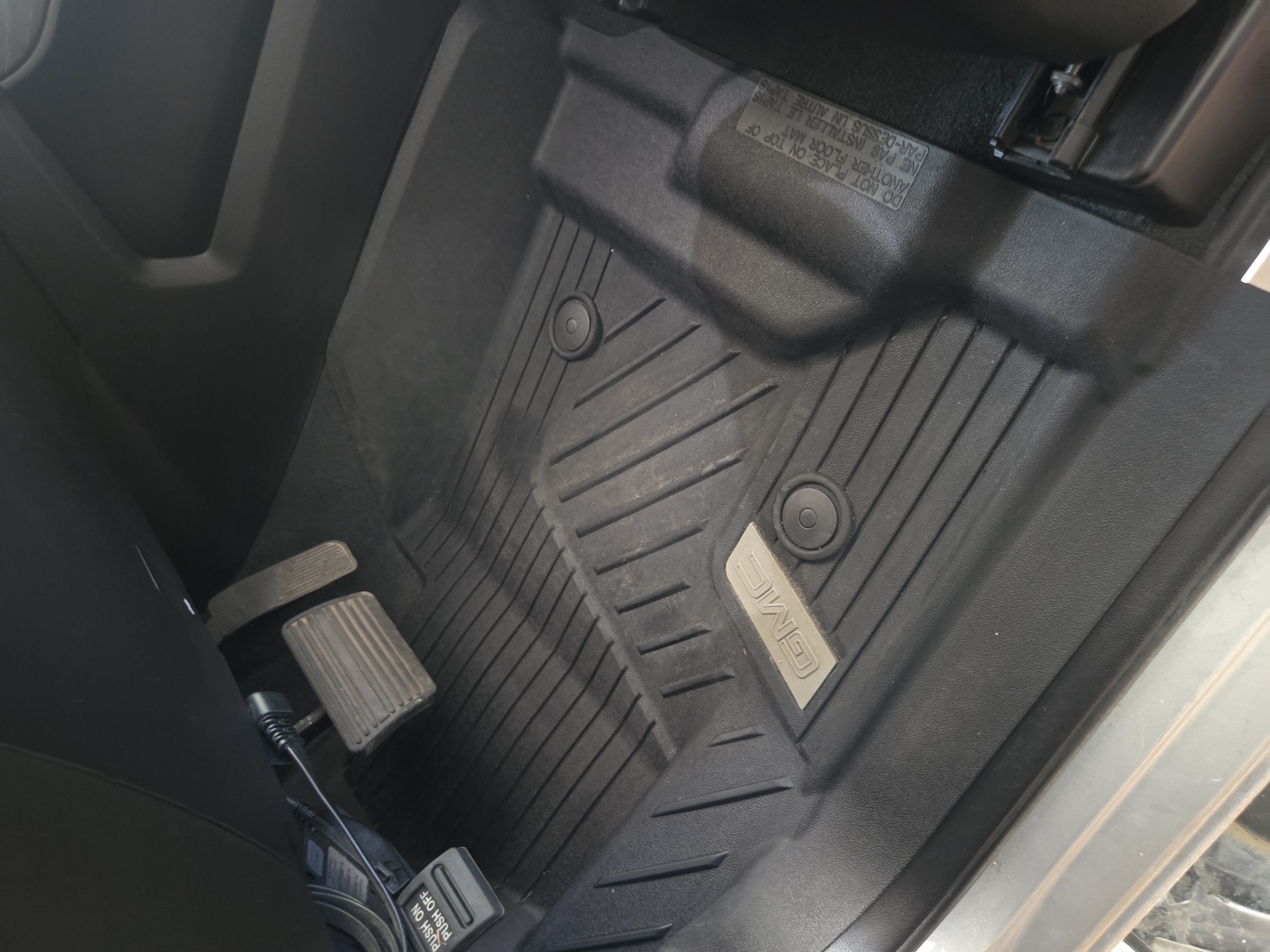 Clean GMC truck front floor mat after interior detailing