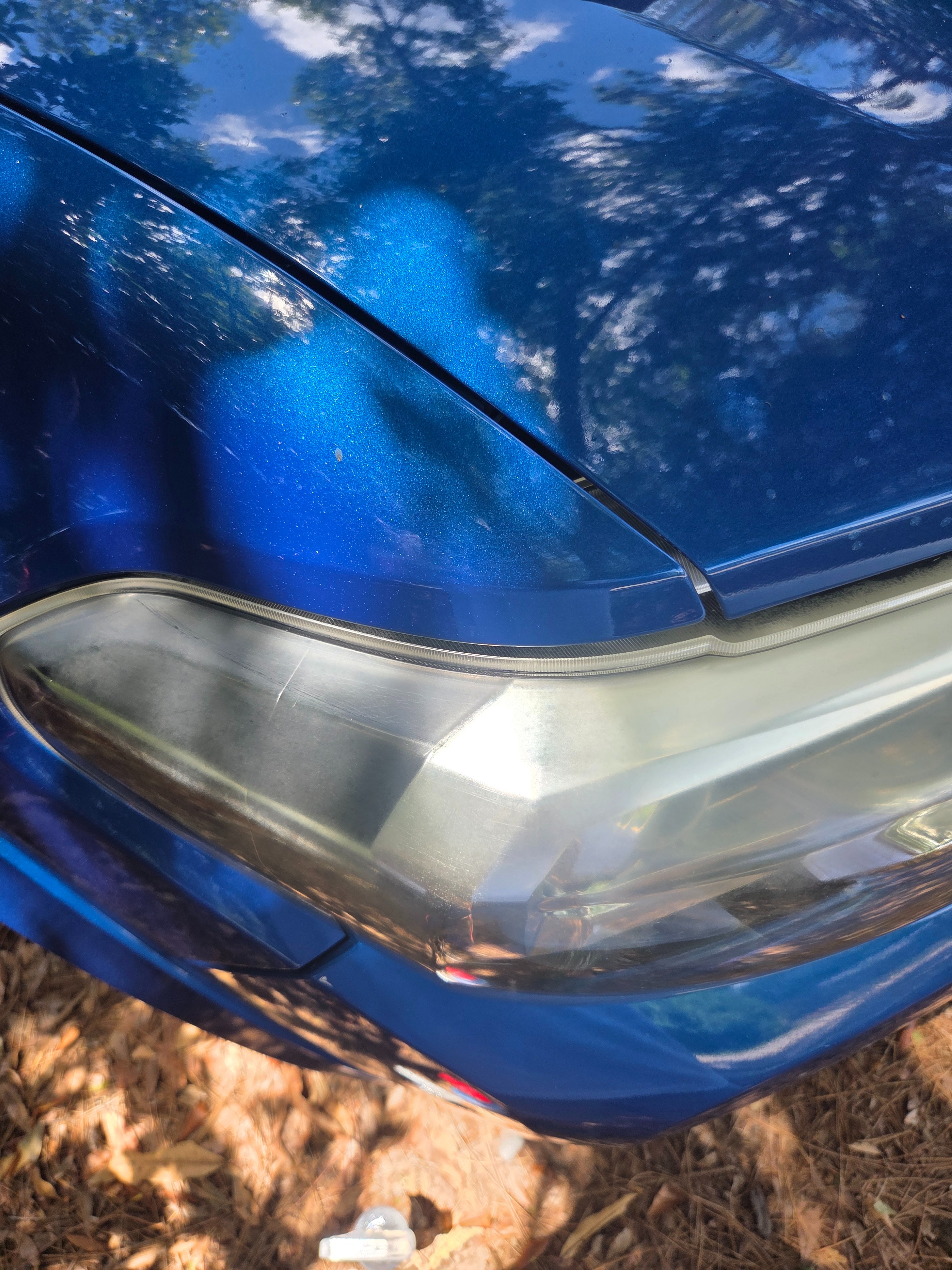 Hazy, oxidized headlight before restoration, angle 2