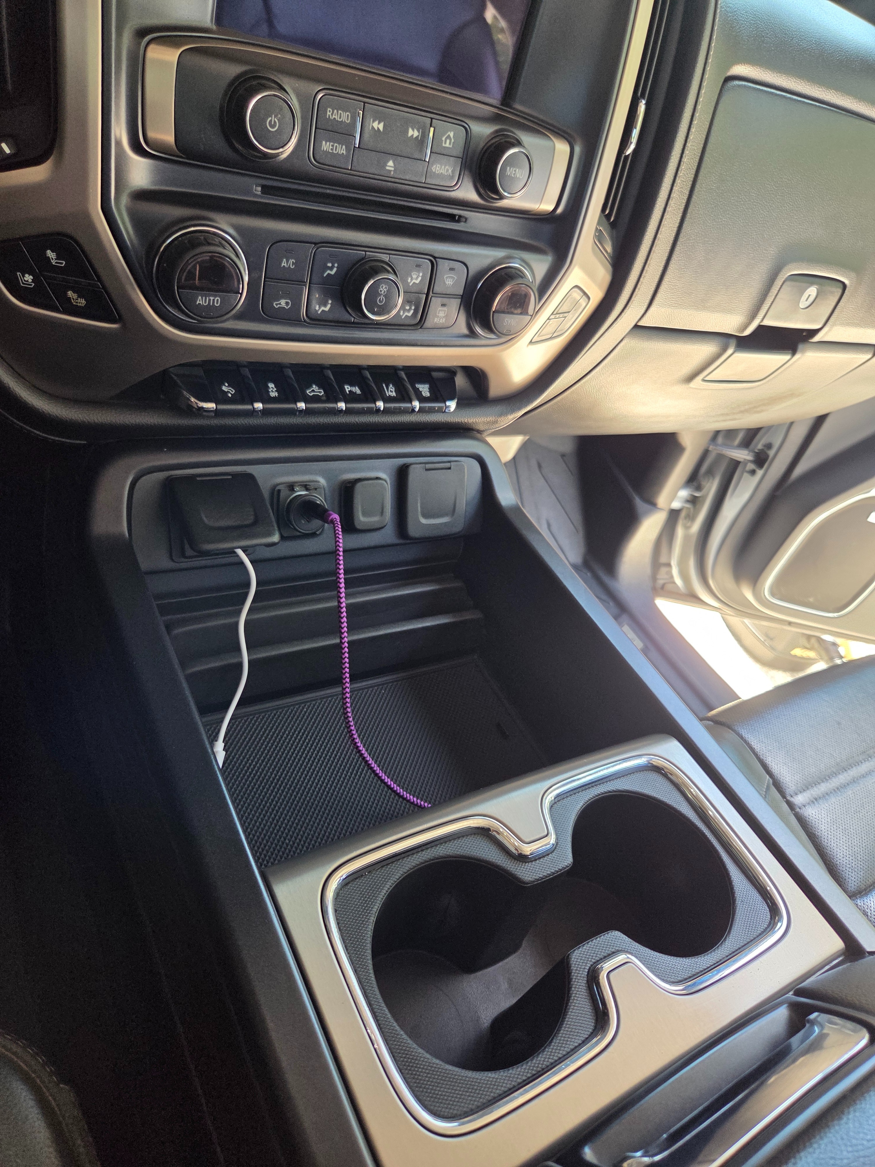 Clean and tidy GMC truck center console after interior detailing
